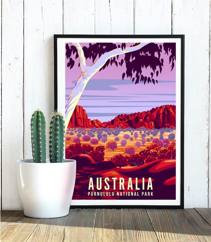An illustrated custom poster Purnululu National Park, Australia sitting on a wooden floor.